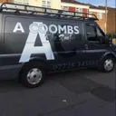 A Coombs Roofing logo